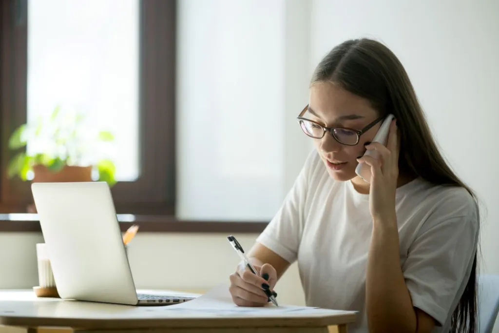 female-worker-consulting-client-phone